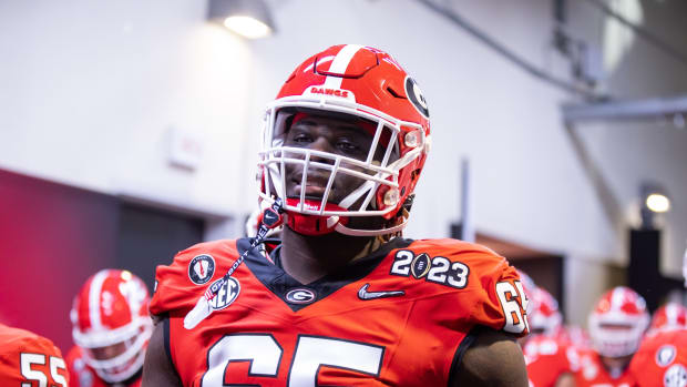 Jan 9, 2023; Inglewood, CA, USA; Georgia Bulldogs offensive lineman Amarius Mims (65) against the TCU Horned Frogs during the CFP national championship game at SoFi Stadium.